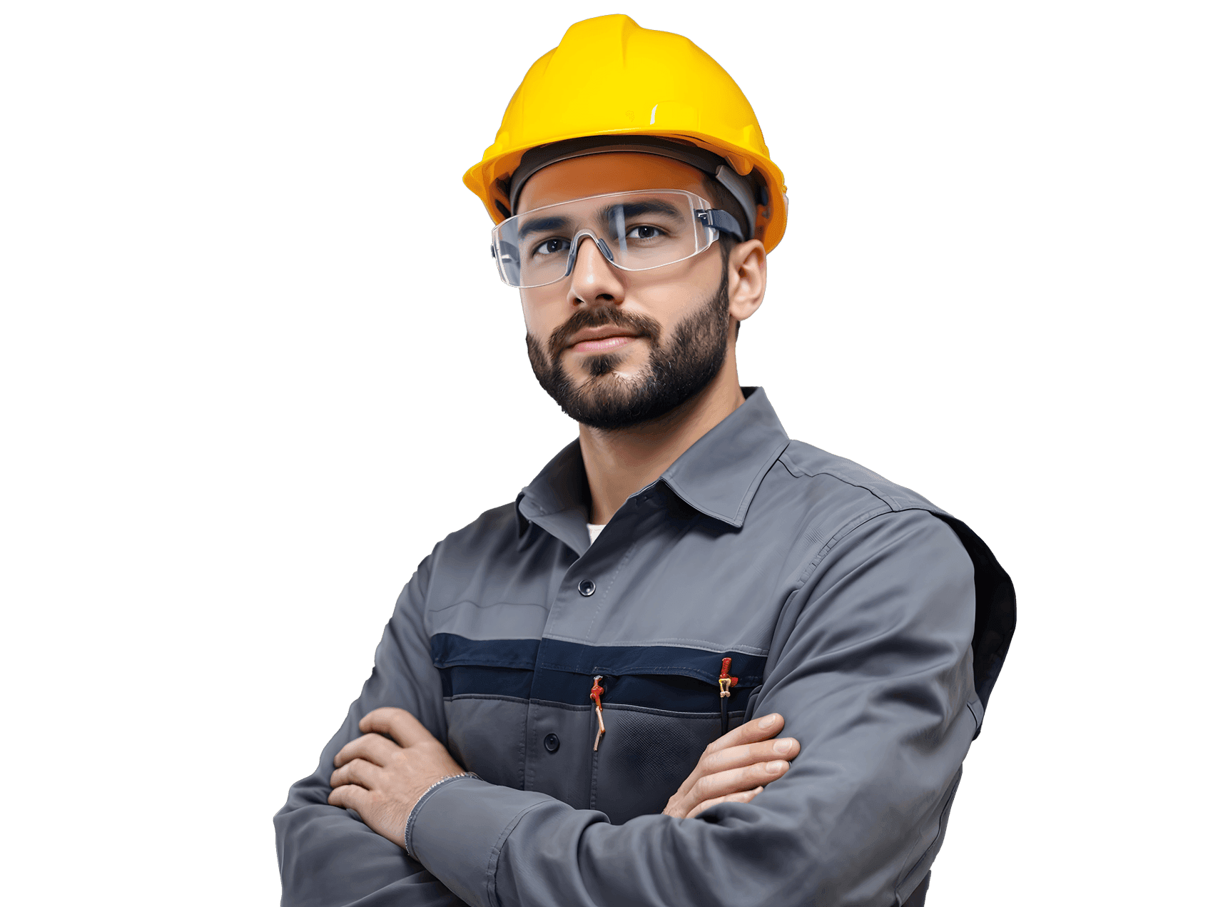 Ein junger Mann mit einem Bauhelm steht in Arbeitskleidung vor einer Heizungsinstallation im Keller Ein junger Mann mit einem Bauhelm steht in Arbeitskleidung vor einer Heizungsinstallation im Keller